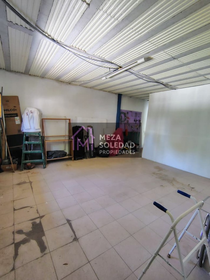 CASA CON DEPARTAMENTO 